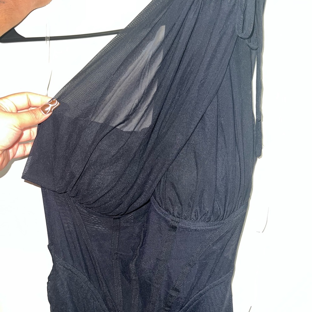 black bodycon dress some see through areas
